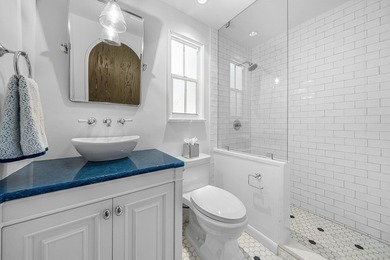 This iconic 1920's Mediterranean Revival Home blends historic - photo 10