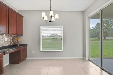Welcome to this spacious two-story home set on a serene pond and - photo 12