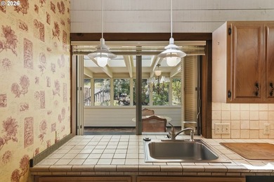 Custom townhouse tucked away on 3+ private, in-town acres - photo 12