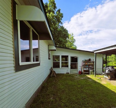 Charming Mena Home with Modern Upgrades & Endless Potential! - photo 7