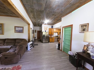 Charming Mena Home with Modern Upgrades & Endless Potential! - photo 10