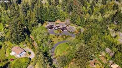 Custom townhouse tucked away on 3+ private, in-town acres - photo 46