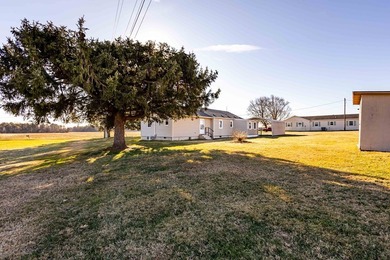 Charming, cozy, and full of character, this beautifully