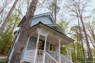 Welcome to this charming waterfront retreat offering the perfect - photo 13