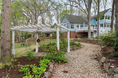 Welcome to this charming waterfront retreat offering the perfect - photo 16