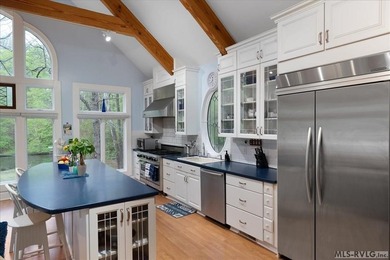 Welcome to this charming waterfront retreat offering the perfect - photo 25