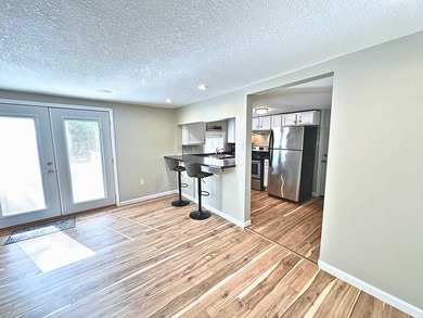 NO PROJECTS NEEDED! FULL RENO! This Irish Lake cottage is - photo 3