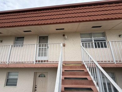 Welcome to this bright two-bedroom, two-bathroom condominium in - photo 2
