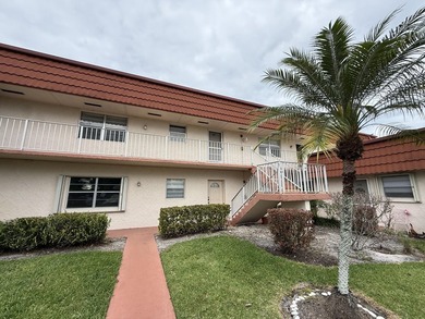 Welcome to this bright two-bedroom, two-bathroom condominium in - photo 3