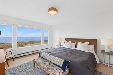 Recently expanded and renovated with a fresh, modern coastal - photo 15