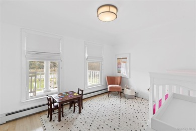 Recently expanded and renovated with a fresh, modern coastal - photo 16