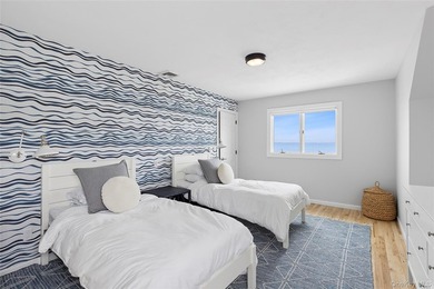 Recently expanded and renovated with a fresh, modern coastal - photo 20