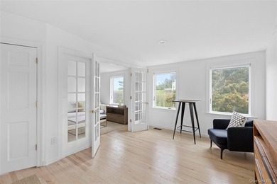 Recently expanded and renovated with a fresh, modern coastal - photo 22