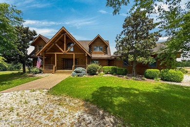If you've been looking for usable acreage, a luxury log cabin, a - photo 3