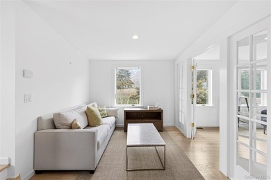 Recently expanded and renovated with a fresh, modern coastal - photo 23