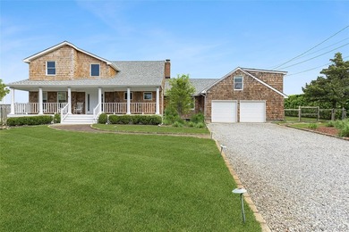 Recently expanded and renovated with a fresh, modern coastal - photo 25