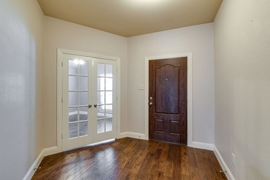 Step through the front door and into a bright flex space framed - photo 4