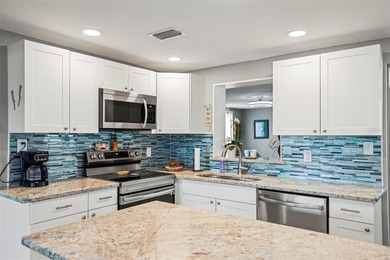 Come check out this gorgeous updated waterfront pool home - photo 7