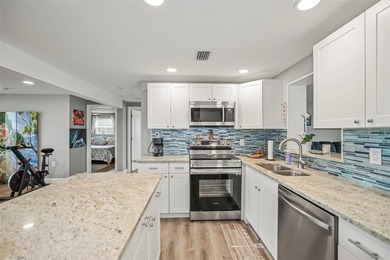 Come check out this gorgeous updated waterfront pool home - photo 8