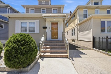Welcome to this beautifully maintained detached two-family home - photo 1
