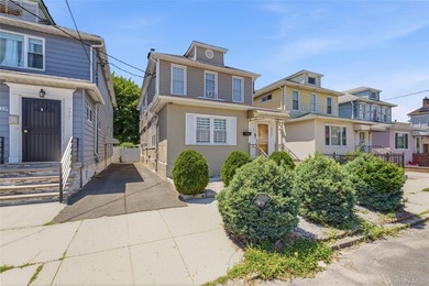 Welcome to this beautifully maintained detached two-family home - photo 2