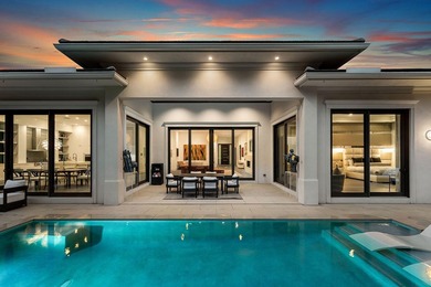 A single-story masterpiece unfolds in the prestigious Royal Palm - photo 3