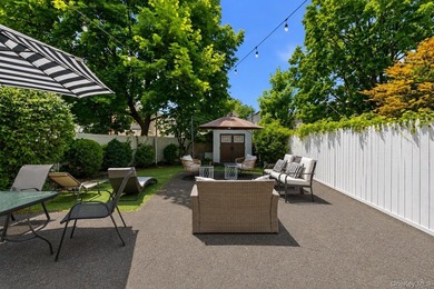 Welcome to this beautifully maintained detached two-family home - photo 5