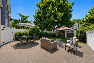 Welcome to this beautifully maintained detached two-family home - photo 6