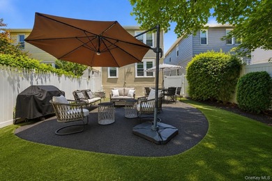 Welcome to this beautifully maintained detached two-family home - photo 7