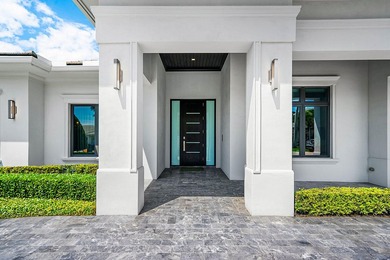 A single-story masterpiece unfolds in the prestigious Royal Palm - photo 7