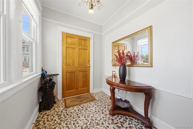 Welcome to this beautifully maintained detached two-family home - photo 8