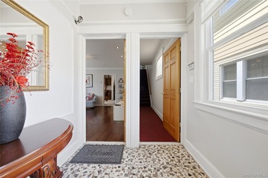 Welcome to this beautifully maintained detached two-family home - photo 9