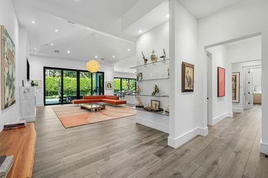 A single-story masterpiece unfolds in the prestigious Royal Palm - photo 10
