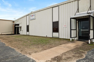 This property offers a manufacturing space and a separate, newer