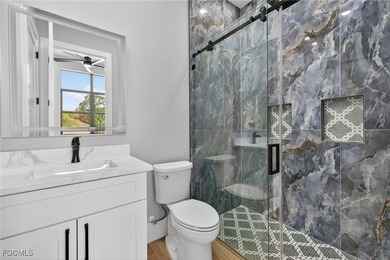 Set within a quiet, low-HOA community in Bonita Springs, this - photo 29