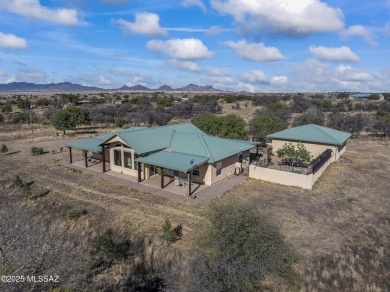 Imagine living in a Sonoita hilltop oasis studded with live oak