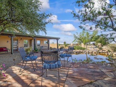 Imagine living in a Sonoita hilltop oasis studded with live oak