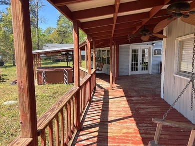 Two deeded waterfront lots on Lake Murvaul. Two homes. The - photo 14