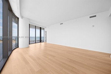 Discover sophisticated waterfront living at UNA Residences in - photo 4