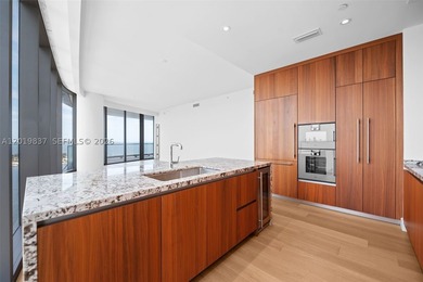 Discover sophisticated waterfront living at UNA Residences in - photo 7