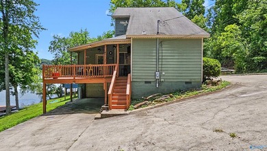 Enjoy relaxed waterfront living where Sugar Creek meets the Elk - photo 5