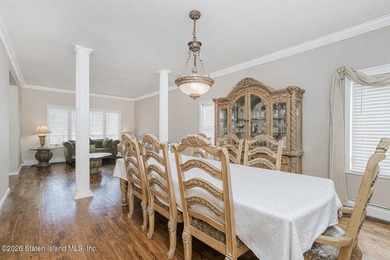 Welcome to this well maintained two-family detached side hall - photo 12