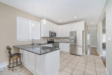 Welcome to this well maintained two-family detached side hall - photo 13