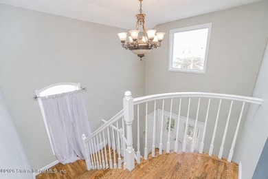 Welcome to this well maintained two-family detached side hall - photo 20