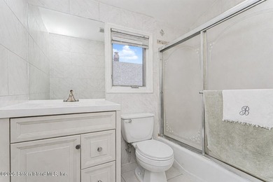 Welcome to this well maintained two-family detached side hall - photo 21
