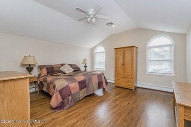 Welcome to this well maintained two-family detached side hall - photo 26