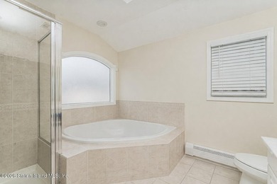 Welcome to this well maintained two-family detached side hall - photo 29