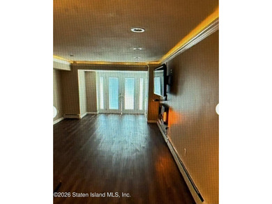 Welcome to this well maintained two-family detached side hall - photo 31