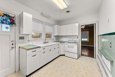 Cozy well-built Brick Rancher on tucked away 1.06 Acres in the