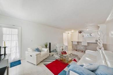Welcome to 2581 N Garden Drive, Unit 206, a beautifully updated - photo 1
